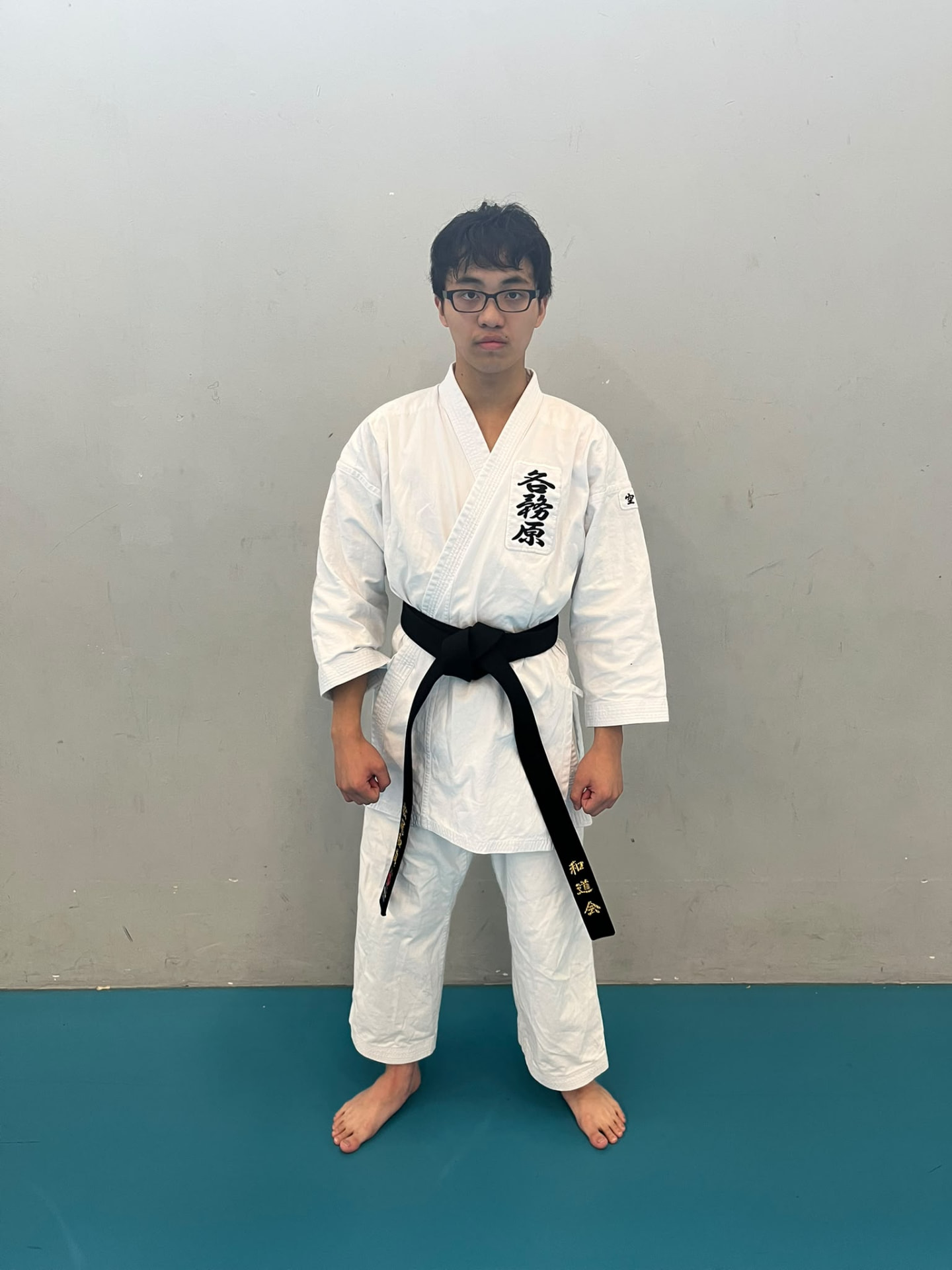 Kazuma Matsuo in his karate gi and black belt